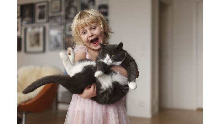 Happy girl with cat