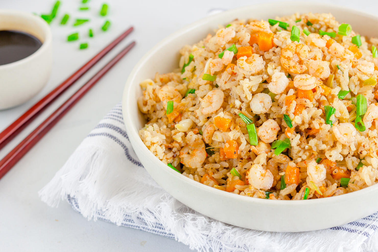 Shrimp Fried Rice in a White Bowl with Chopsticks