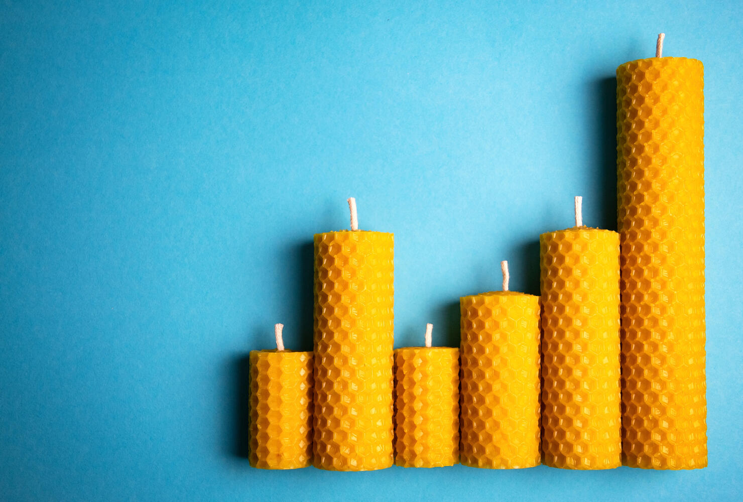 Group Of Candles With Wax Honeycomb