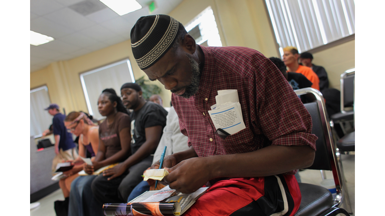 Uninsured Patients Receive Medical Attention At Health Clinic