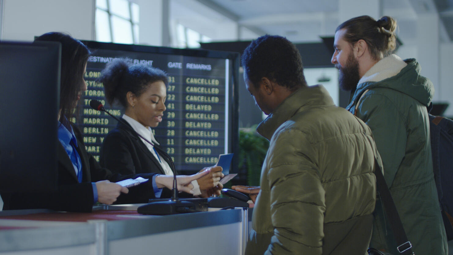 Airport security personnel checking identification