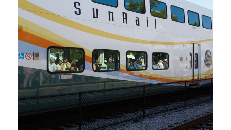 Crowd waits to board the SunRail Commuter Train