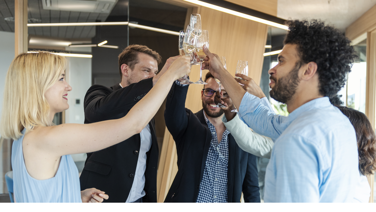 Business people celebrating with champagne
