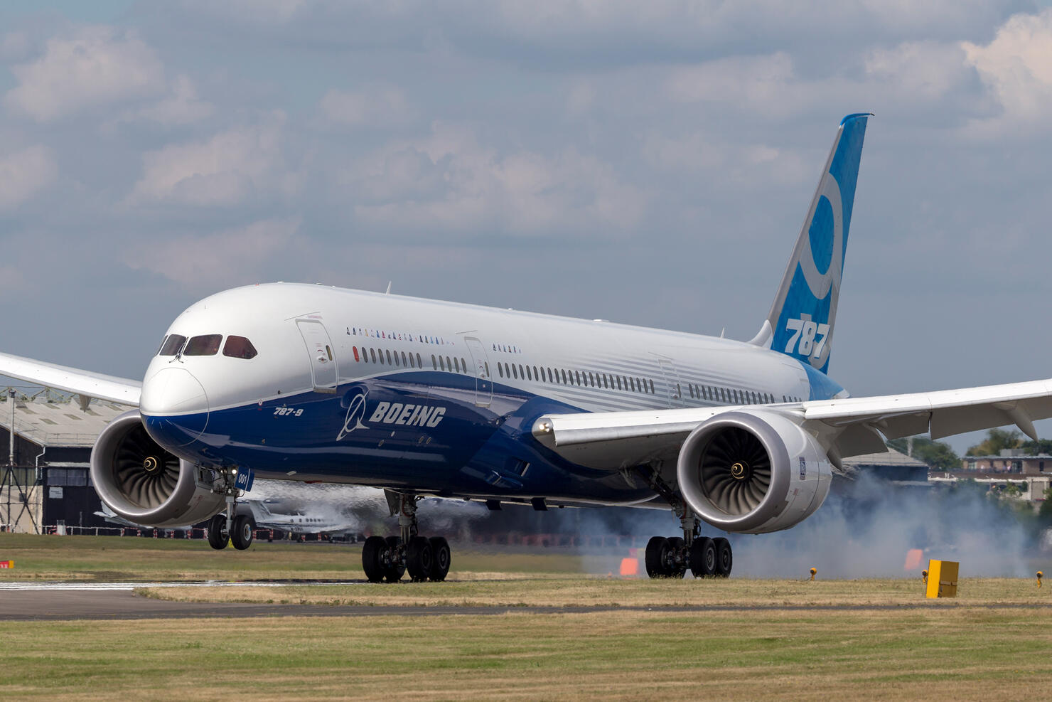 Boeing 787-9 Dreamliner commercial airline aircraft landing at Farnborough Airport.