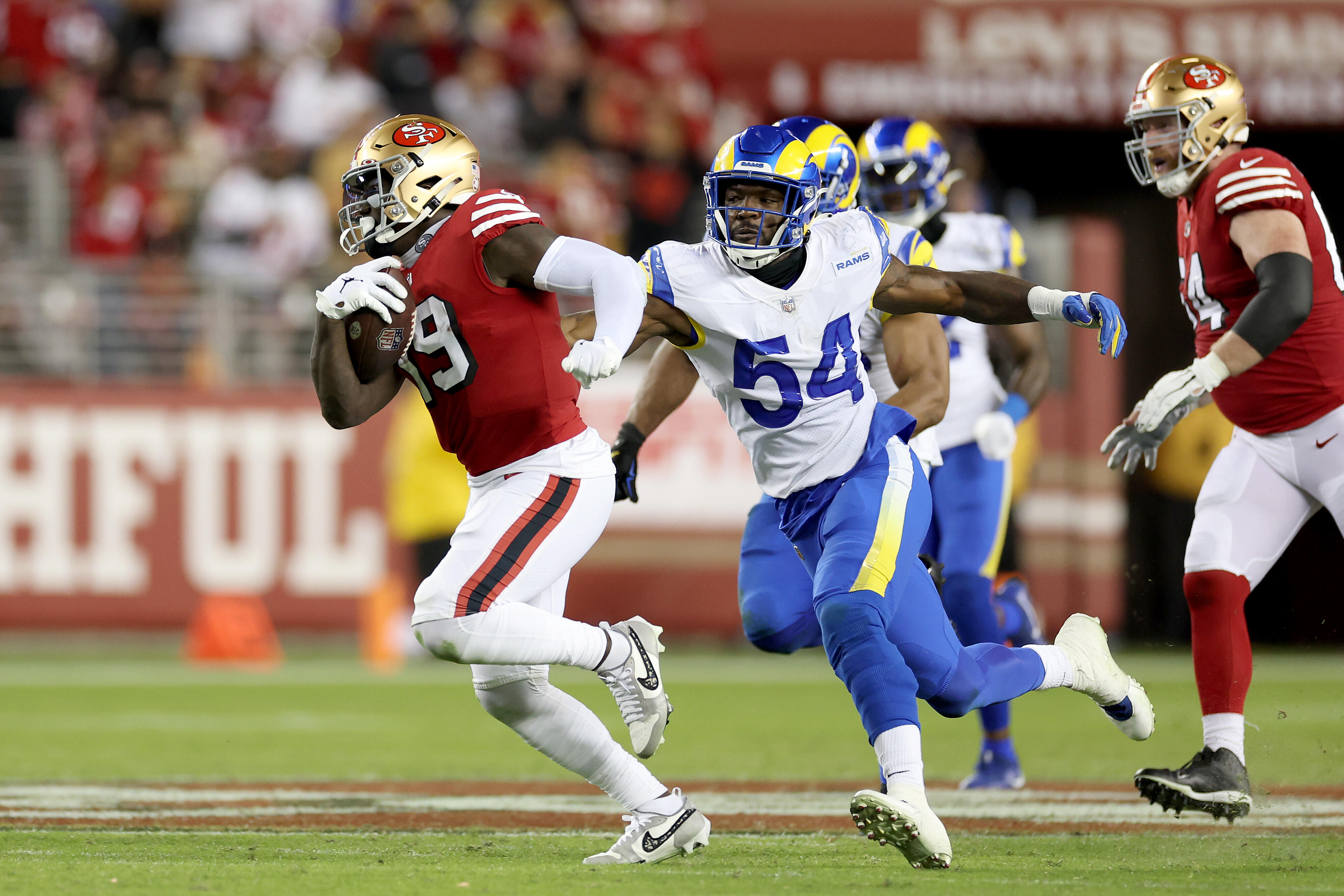 Bobby Wagner trucks protestor carrying pink flare during Rams