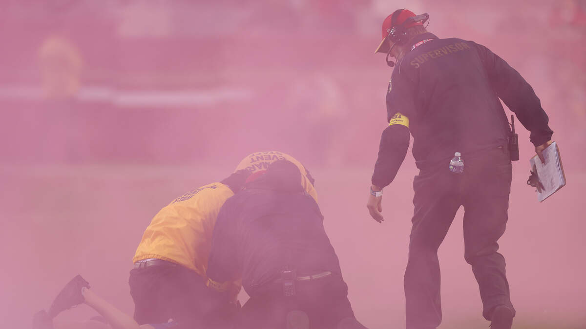 Bobby Wagner trucks protestor carrying pink flare during Rams