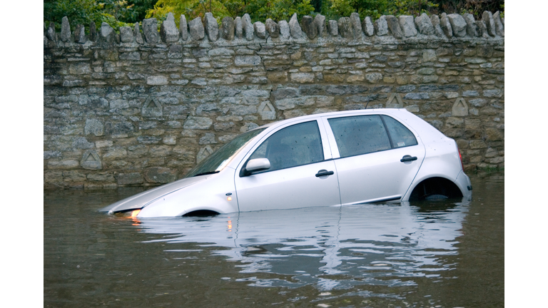 Car stuck in Rural flooding