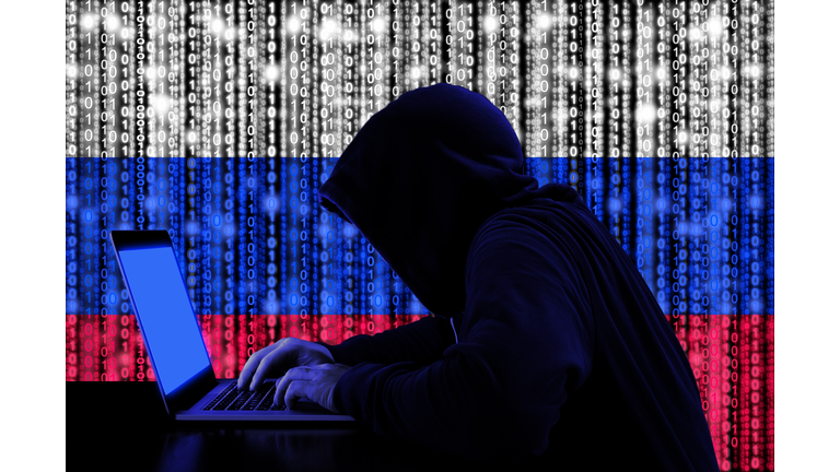 Hacker from russia at work cybersecurity concept