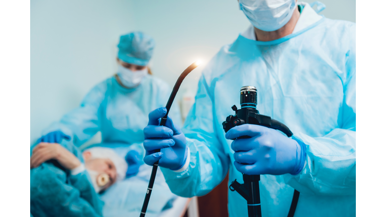 Endoscopy at the hospital. Doctor holding endoscope before gastroscopy