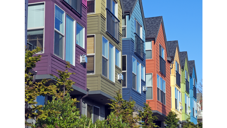 Row of new houses painted various colors in Seattle WA