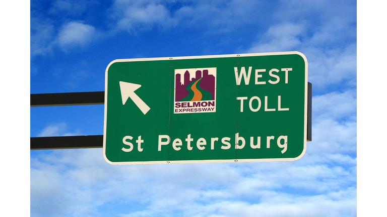 Overhead sign pointing to St. Petersburg via the Selmon Expressway in Tampa FL, USA