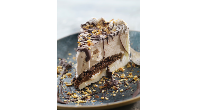 Cookie Dough Ice Cream Cake with Chocolate Sauce and Crushed Almonds