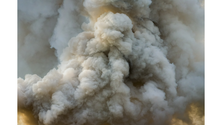 Awesome dark and dense smoke from a a big fire.