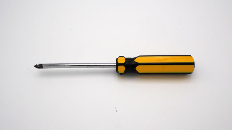 Close-Up Of Screwdriver On White Background