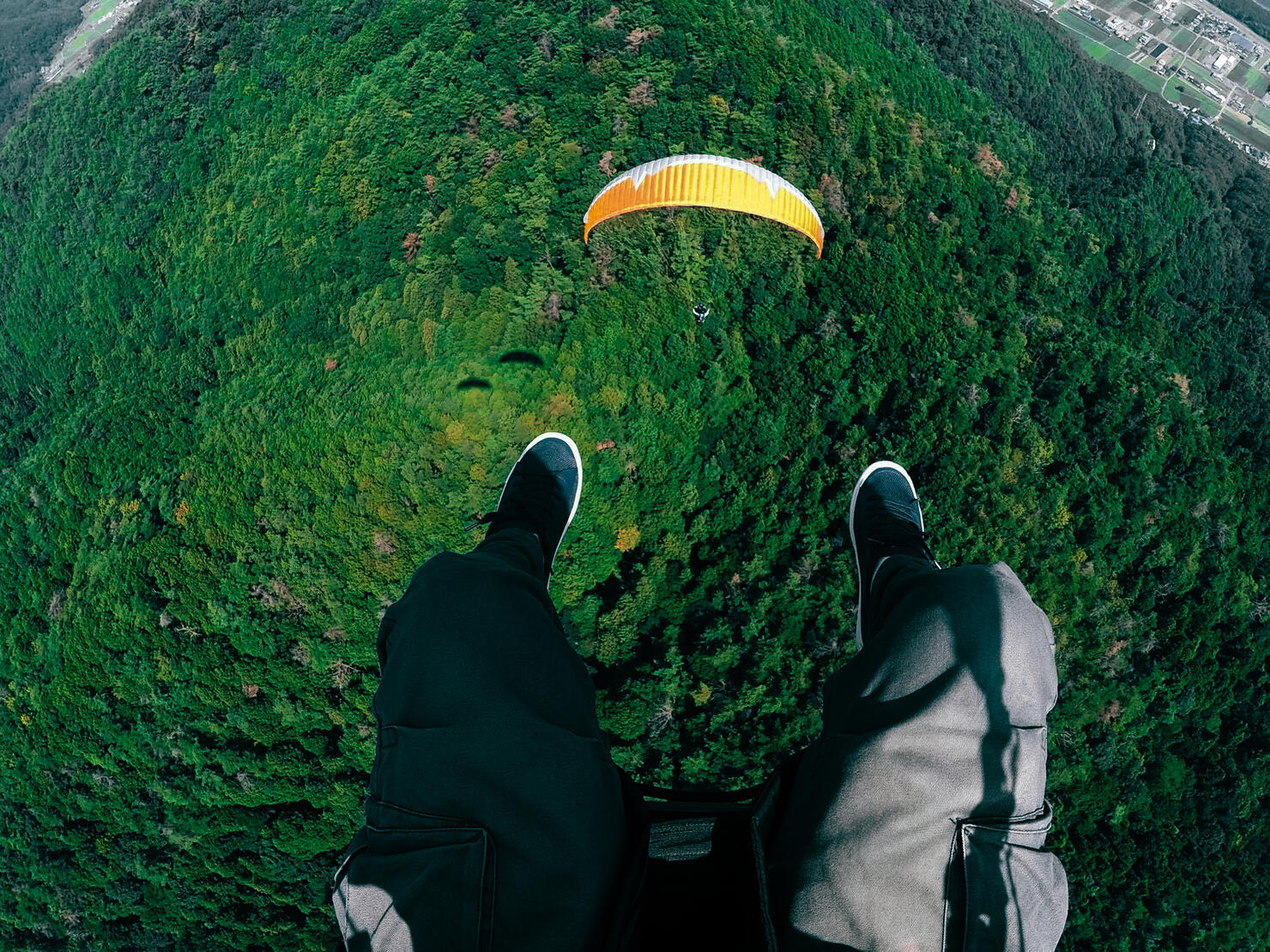 Low Section Of Men Paragliding