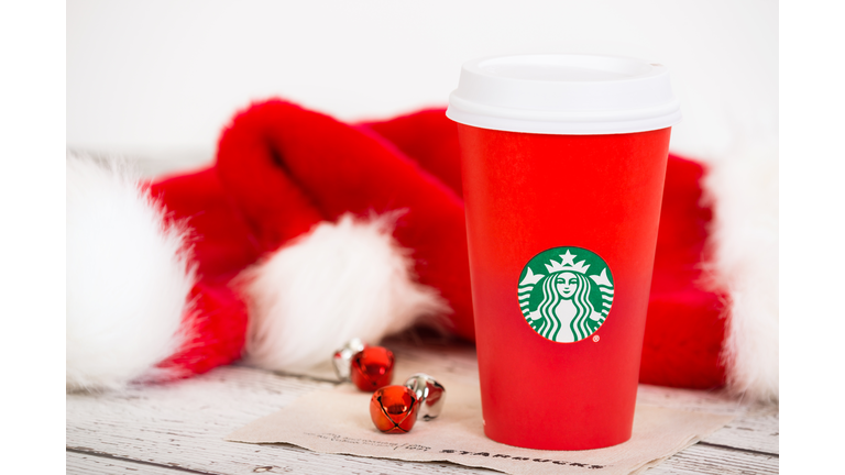 Starbucks holiday beverage in red cup