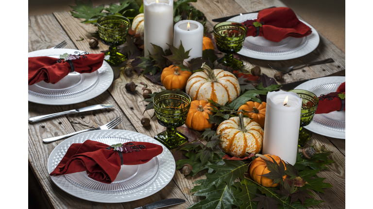 Autumn table setting. Table decoration set for Thanksgiving.