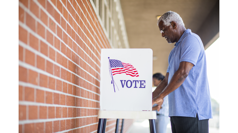 Senior Black Man Voting