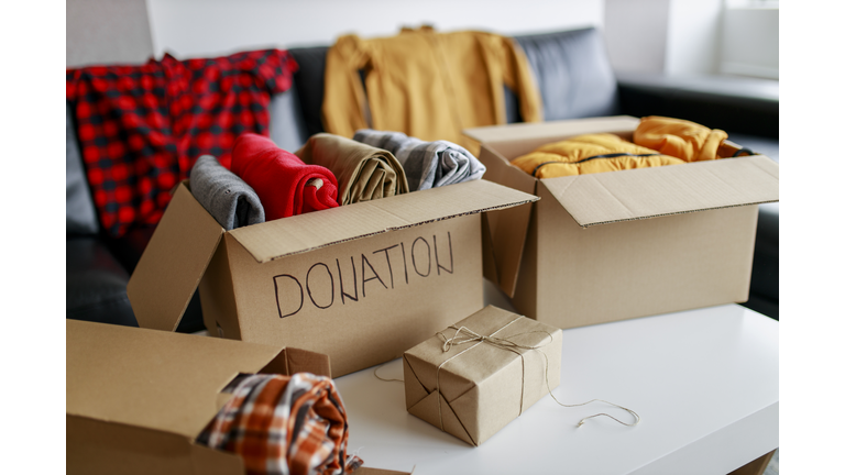 Donation box with stuff (blankets and clothes)