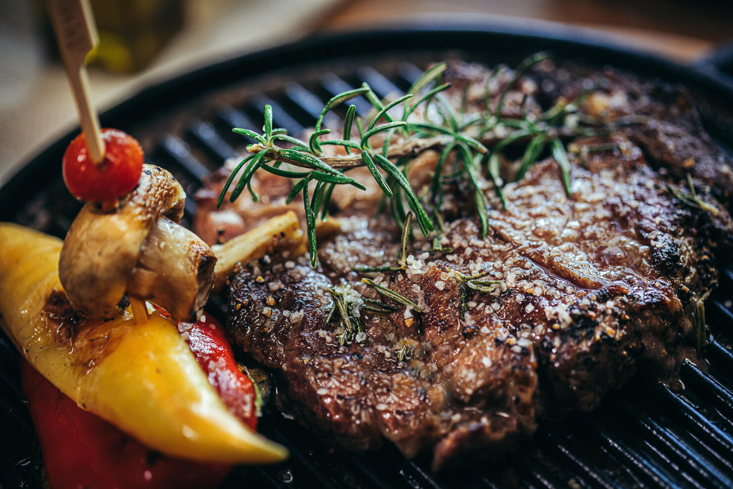 grilled beef steak or rump steak on steel tray