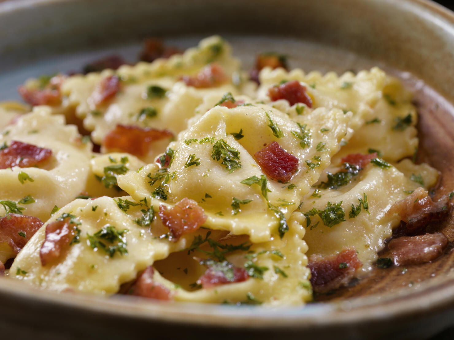 Butter Poached Lobster Ravioli with Bacon and Fresh Parsley