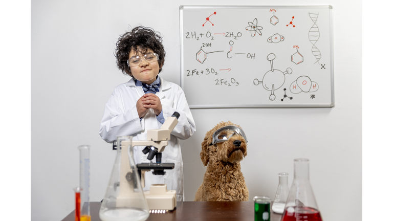 Child and Dog in Funny Science Chemistry Lab