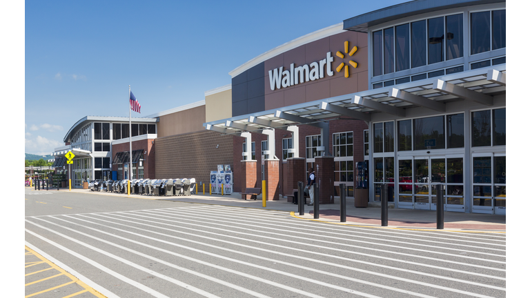Entrance to large Walmart food supermarket or superstore in Haymarket, Virginia, USA