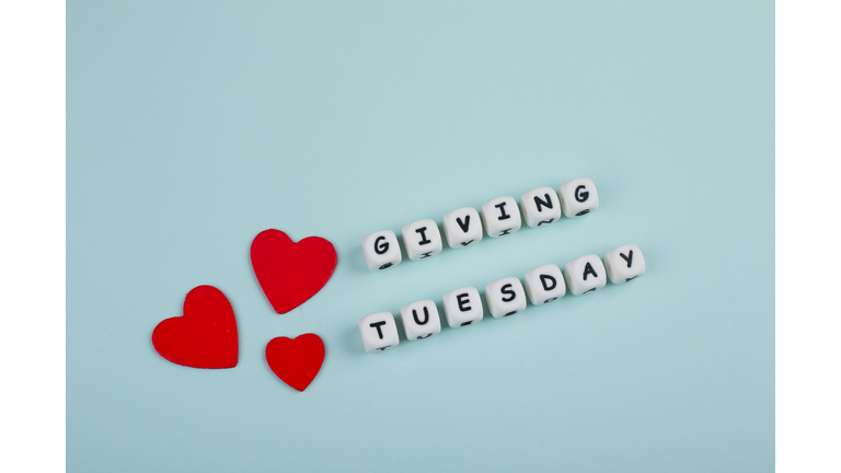 Giving Tuesday donate charity concept with text blue background