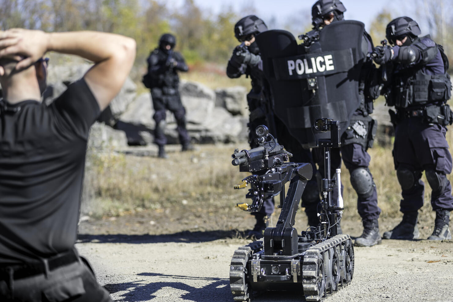 Police Swat Team Officers Using a Mechanical Robot Unit