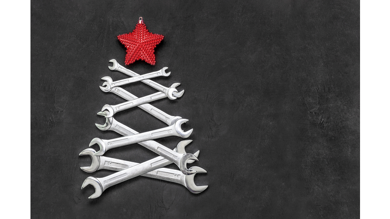 Christmas tree made from steel tools. Happy new year and merry christmas holiday. Copy space