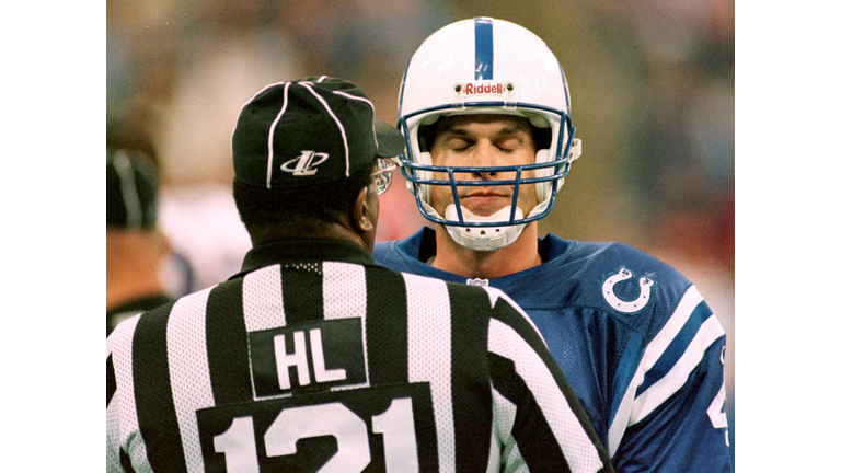 Indianapolis Colts quarterback Jim Harbaugh(R) arg