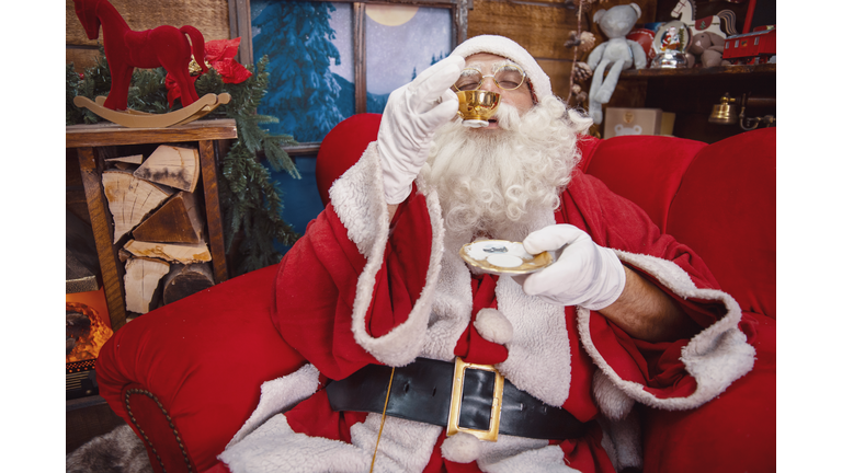 Santa Claus sip his warm tea