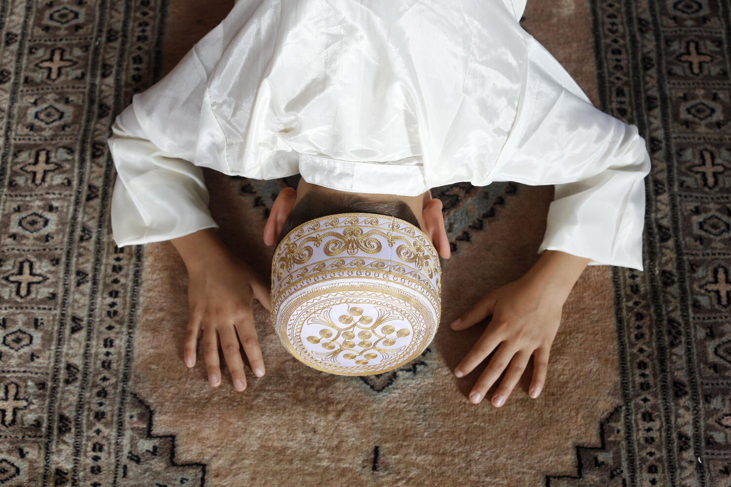 Muslim boy praying