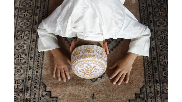 Muslim boy praying