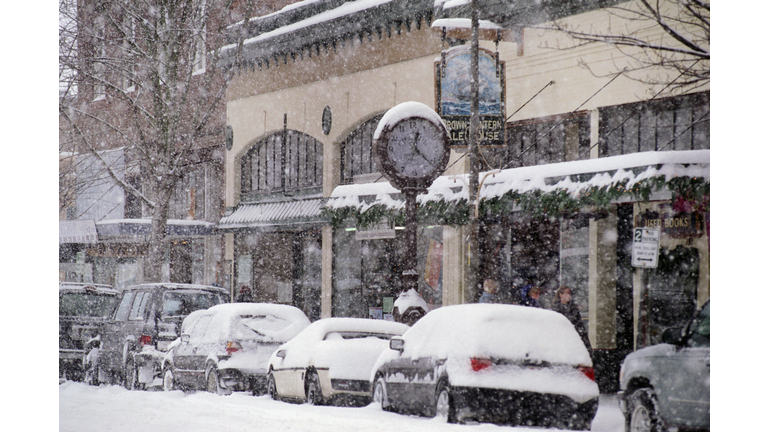 Heavy snow falling on city street
