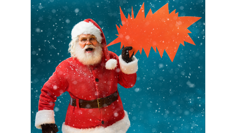 Monstrous Santa Claus showing red sign speech bubble banner