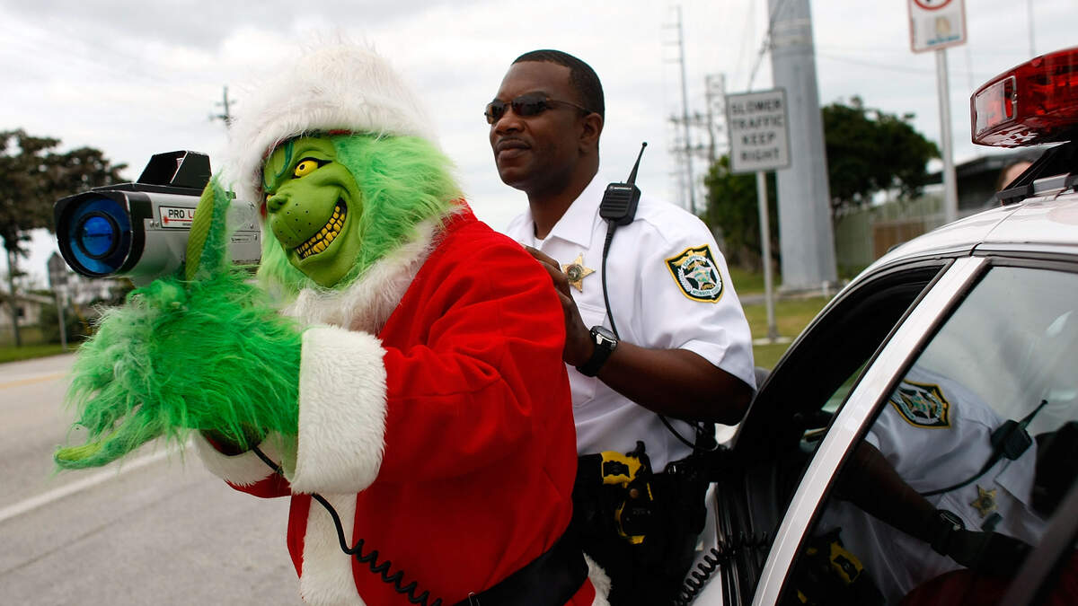 Arizona man ticketed for driving in the HOV lane with an inflatable Grinch  in the passenger seat