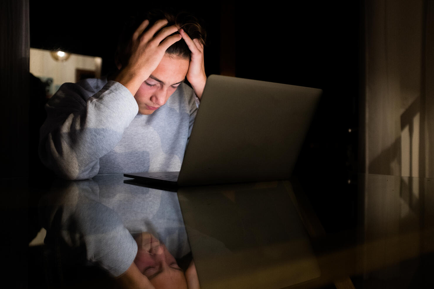 Midsection Of Man Using Laptop
