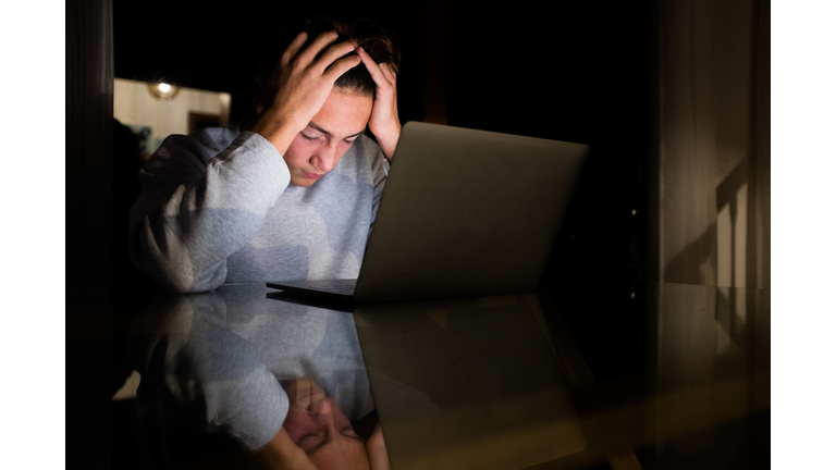 Midsection Of Man Using Laptop