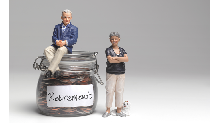 Retired couple with retirement savings jar