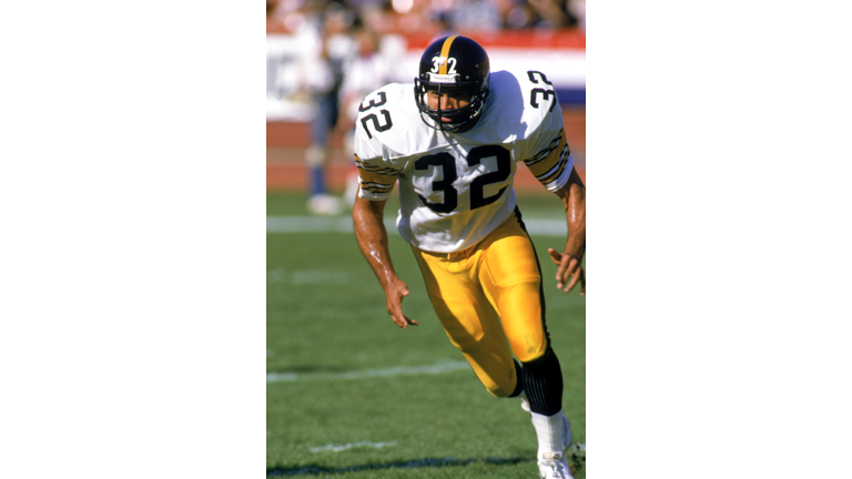 Franco Harris runs