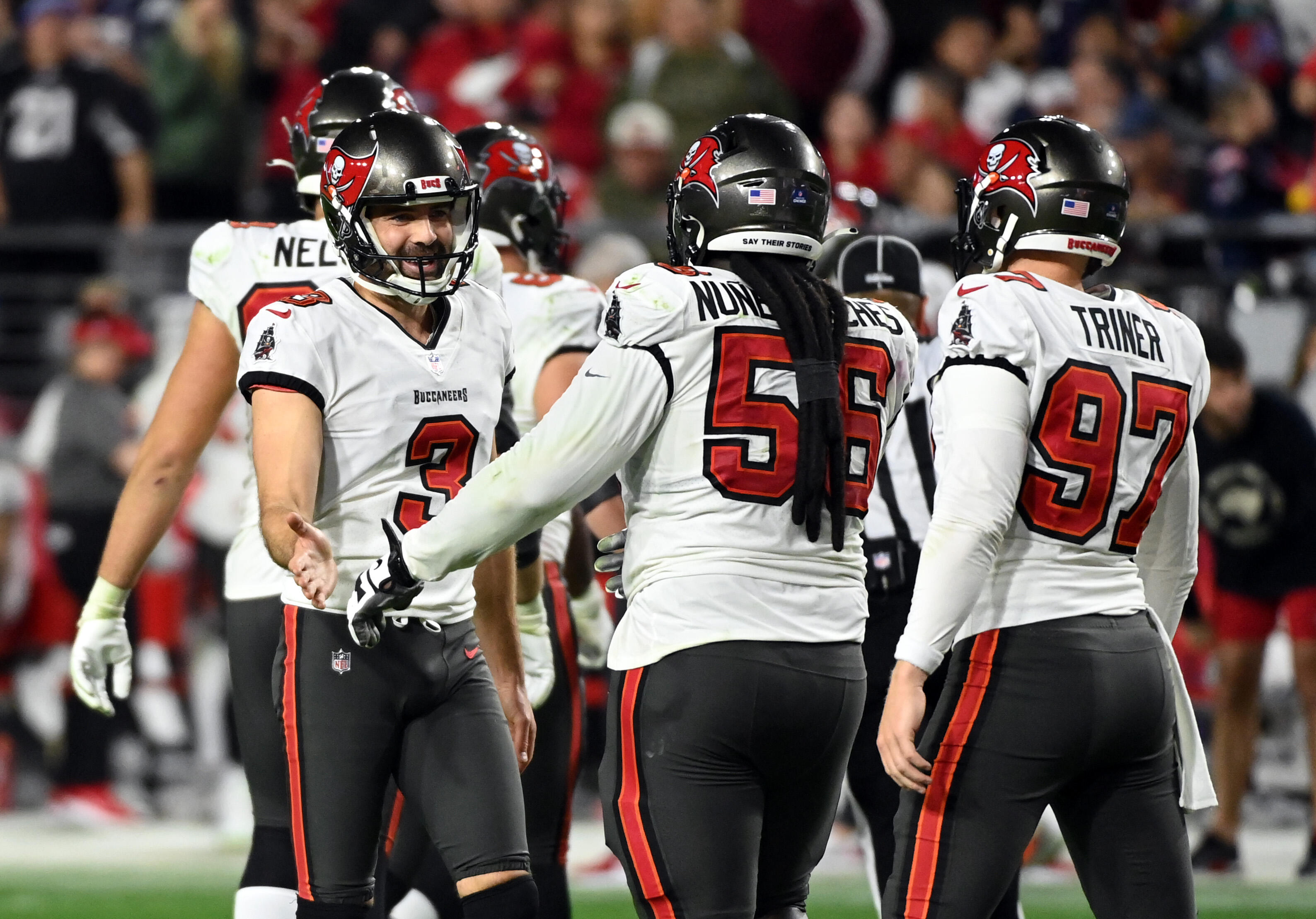 Tom Brady leads comeback as Arizona Cardinals fall to Tampa Bay Buccaneers,  19-16, in overtime on Christmas