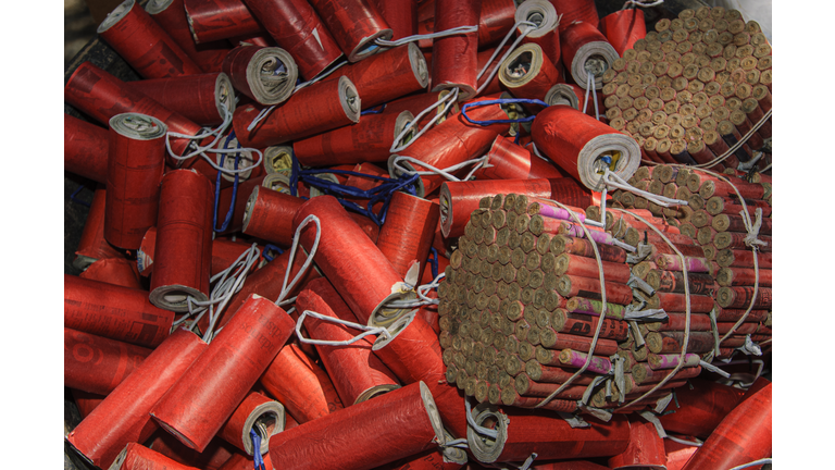 Many Fire Crackers for Sale at Outdoor Merchant Stand