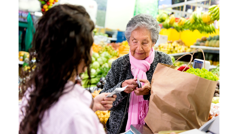 Customer paying at the supermarket