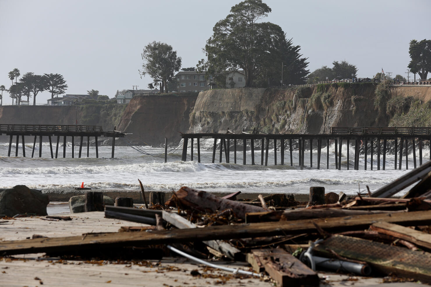 WATCH Golfers Run From 'Massive' Waves Striking California Course iHeart