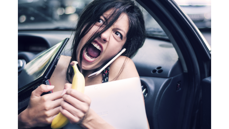 Busy and angry young woman