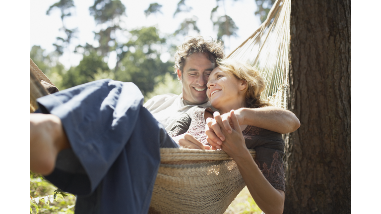 Couple sitting in hammock