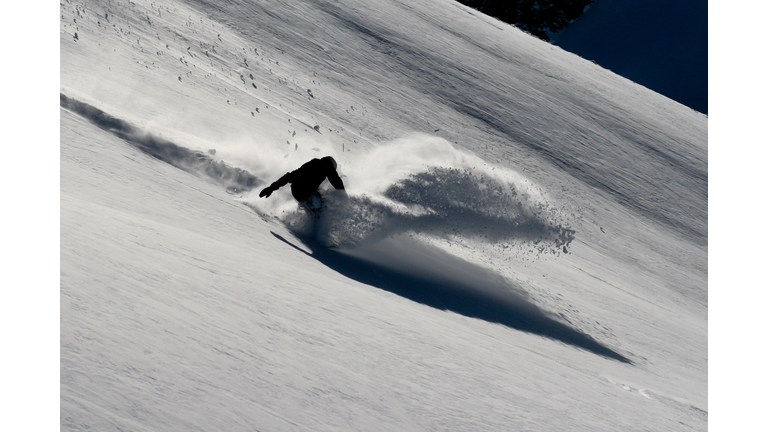powder turn in swiss alps