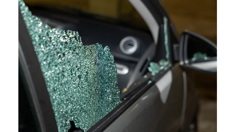 Broken passenger window, car theft in the underground parking.