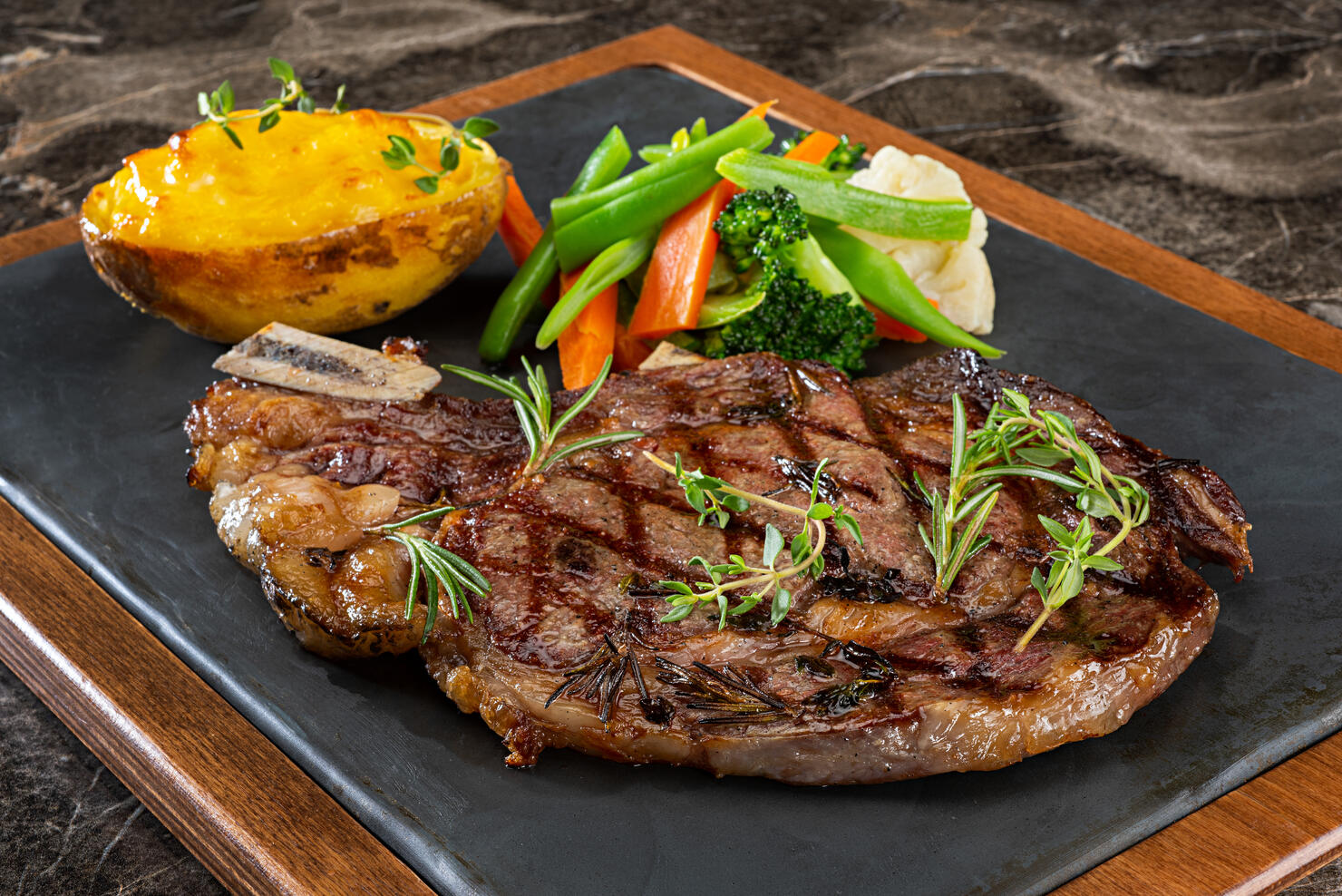 Grilled Steak with Prepared Potato and Steamed Vegetables
